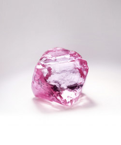 Rough Argyle pink diamond showing its natural colour and crystal formation