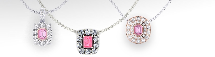 Three custom pink diamond pendant designs showcasing different settings and diamond halos in the design process