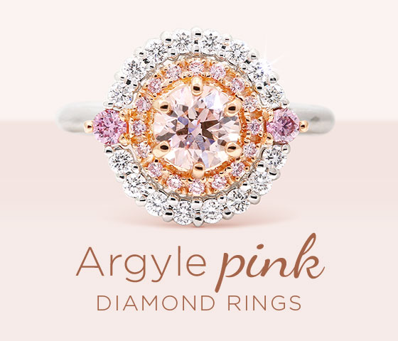 Explore Argyle Pink Diamond rings: round pink centre-diamond with double halo on white gold band
