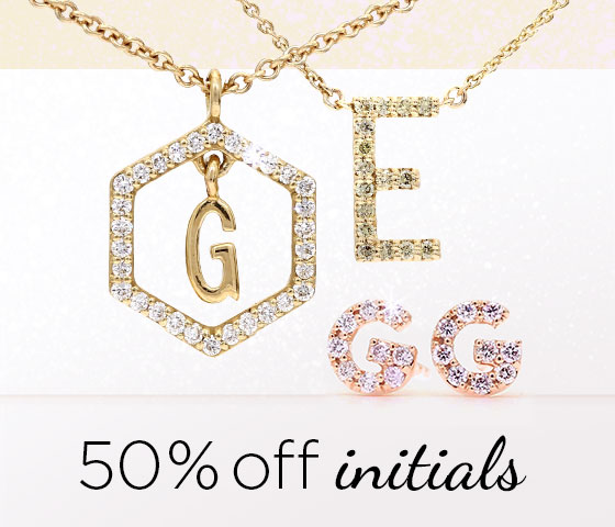 Shop 50% off initials: white diamond letter G pendant, green diamond letter E necklace, and pink diamond G earrings