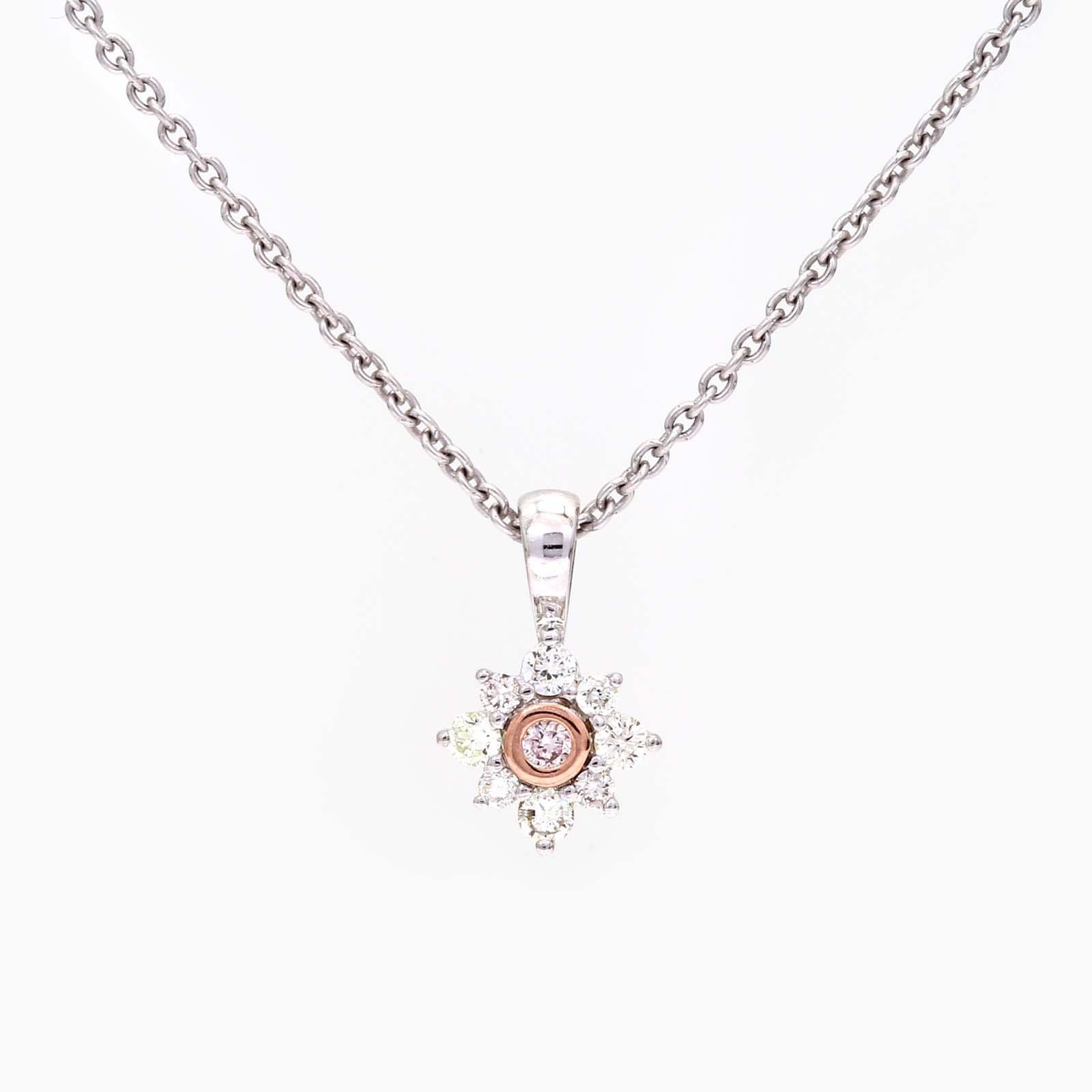 Magnolia Argyle pink and white diamond floral halo pendant
