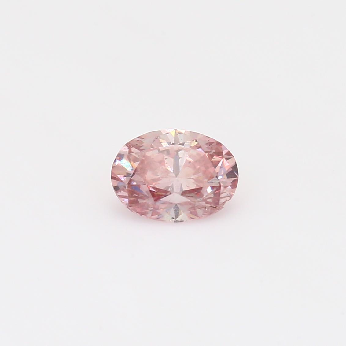 0.59 Carat oval cut GIA certified fancy intense Argyle pink diamond