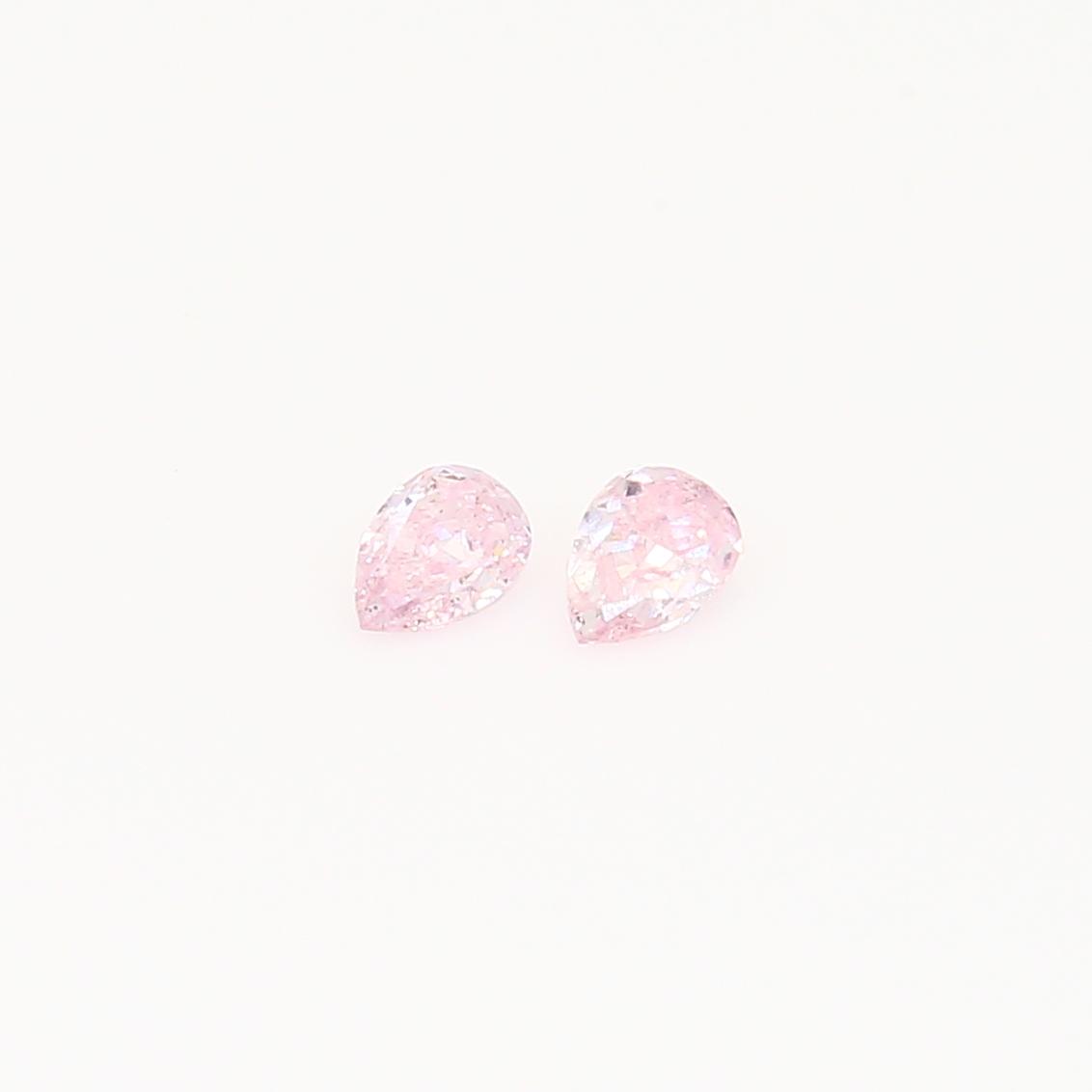 0.18 Total carat pair of pear cut FPP Argyle diamonds
