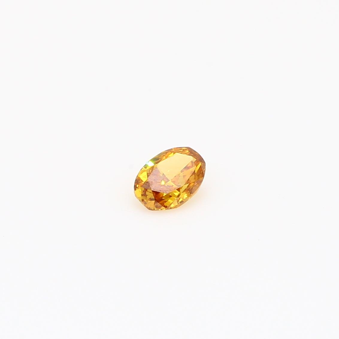 0.15 Carat oval cut orange diamond