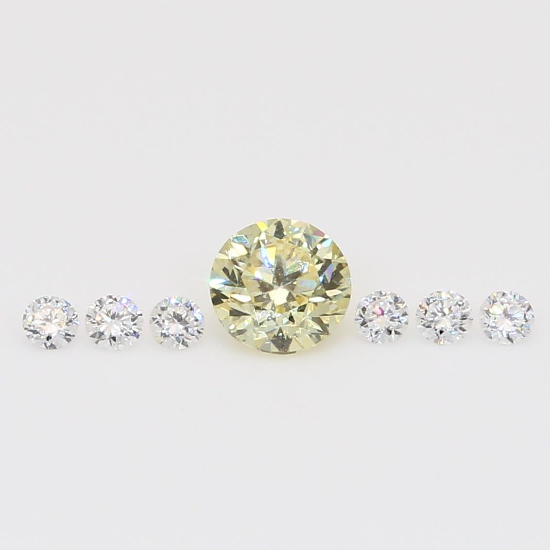 0.48 Total carat parcel of round-cut white and fancy yellow diamonds