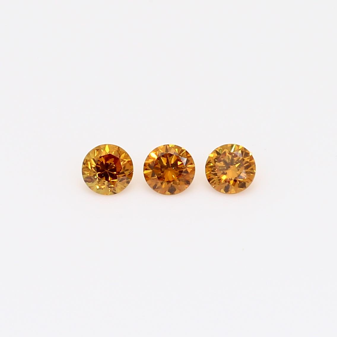 0.24 Total carat trio of round-cut orange diamonds