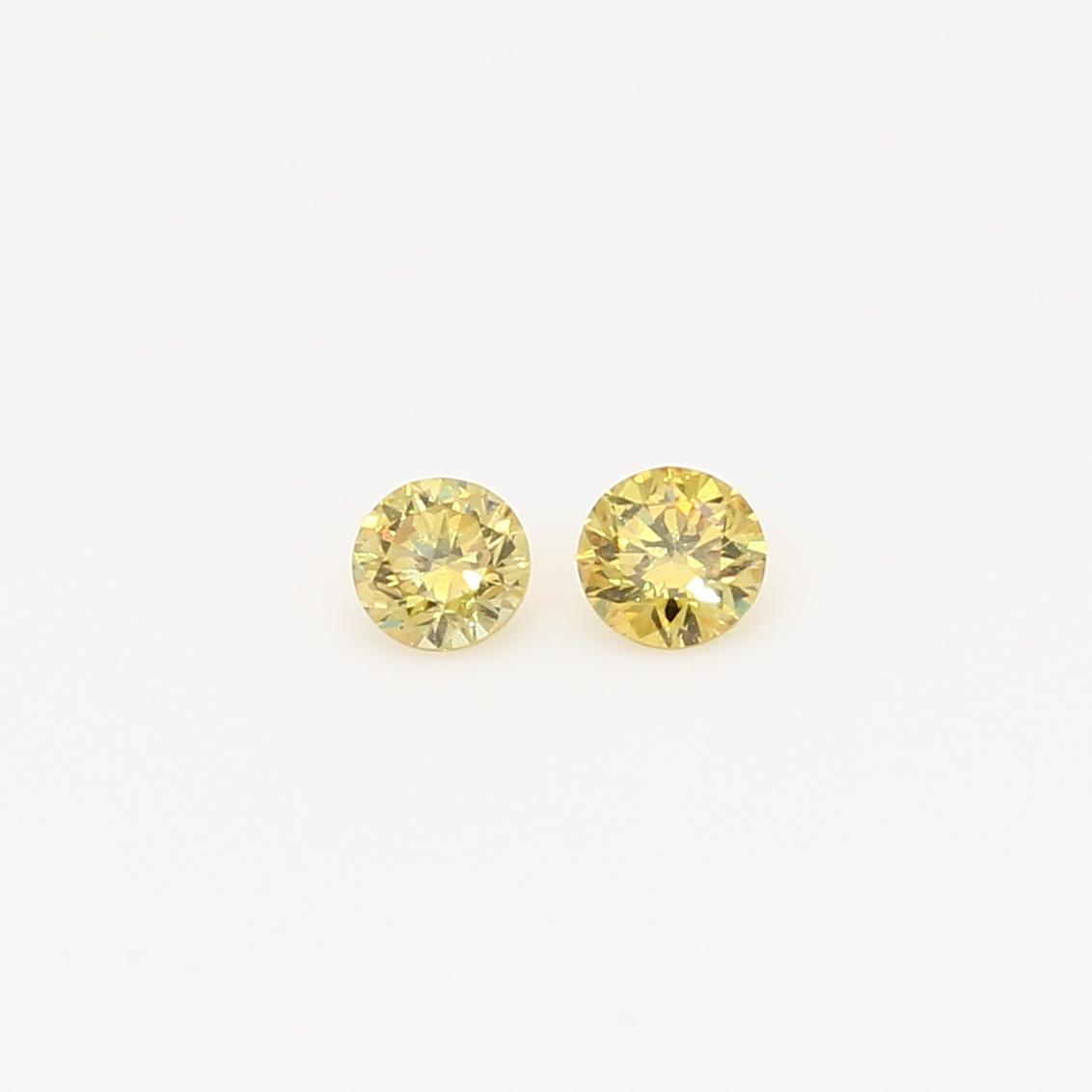 0.20 Total carat trio of round-cut yellow diamonds