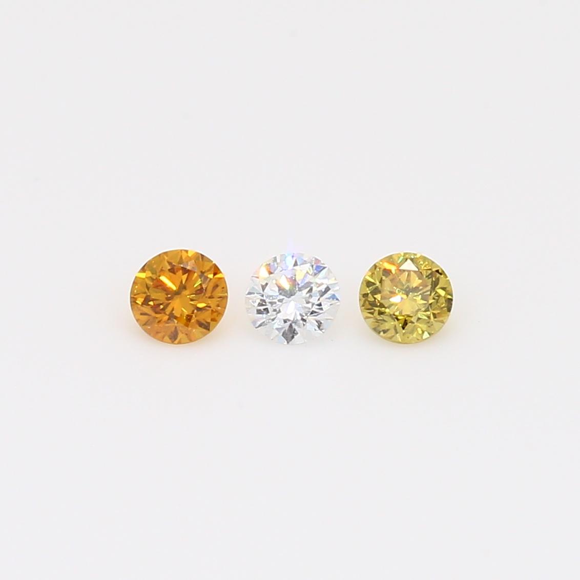 0.26 Total carat trio of round-cut rainbow diamonds