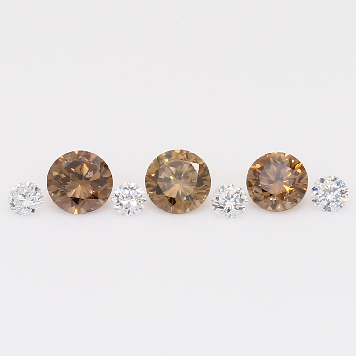 0.41 Total carat parcel of round-cut champagne and white diamonds
