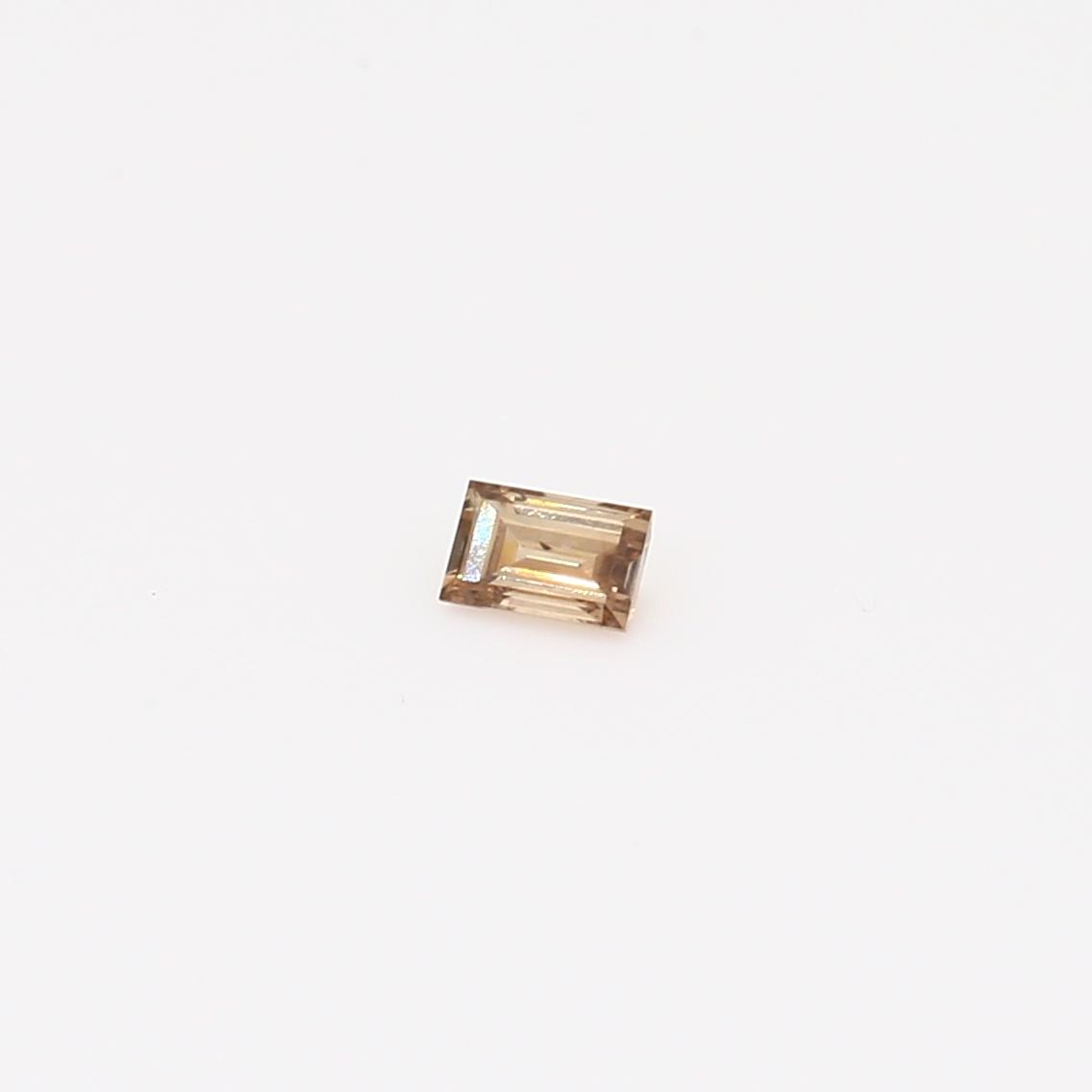 0.08 Carat baguette-cut Argyle champagne diamond