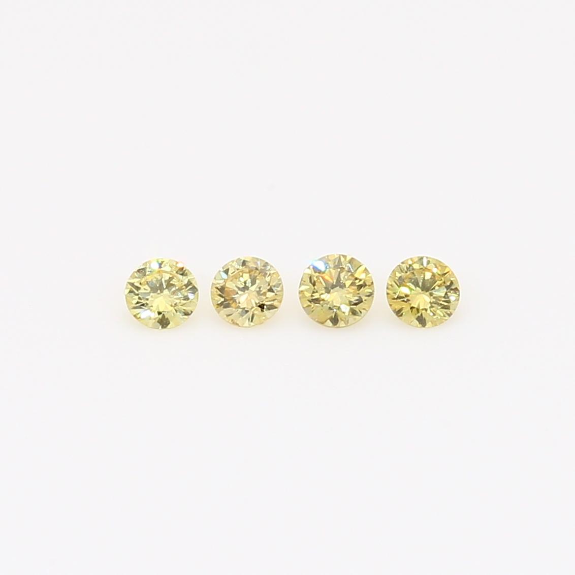 0.16 Total carat parcel of round-cut fancy yellow diamonds