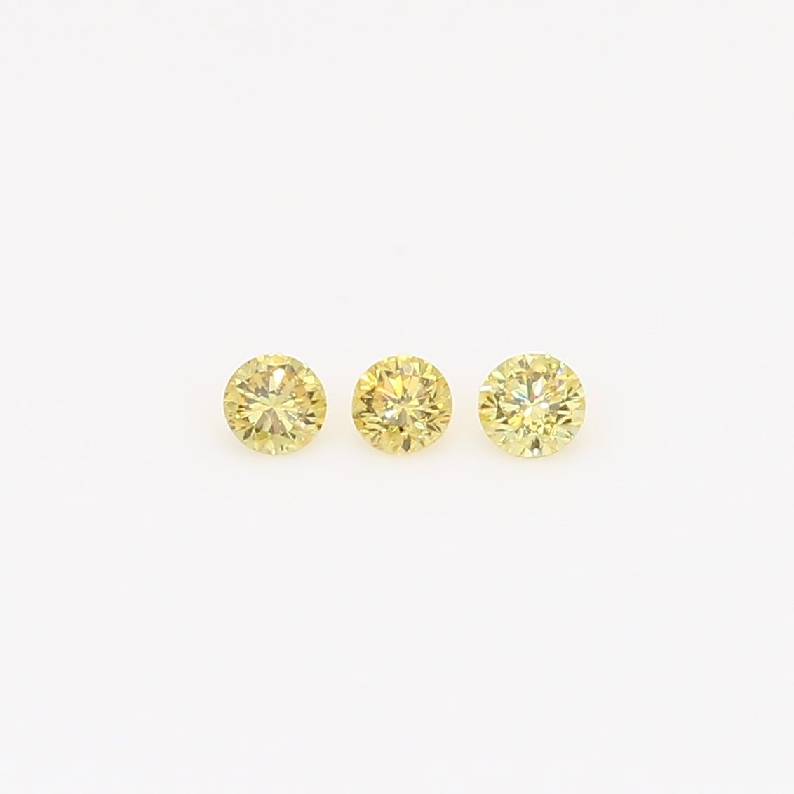 0.12 Total carat trio of round-cut fancy green diamonds