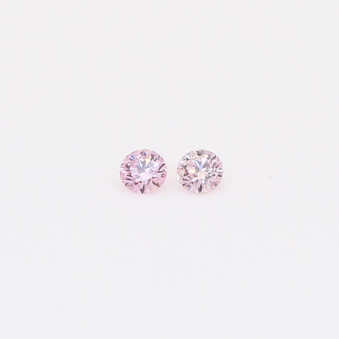 0.09 Total carat pair of round-cut FPP Argyle pink diamonds