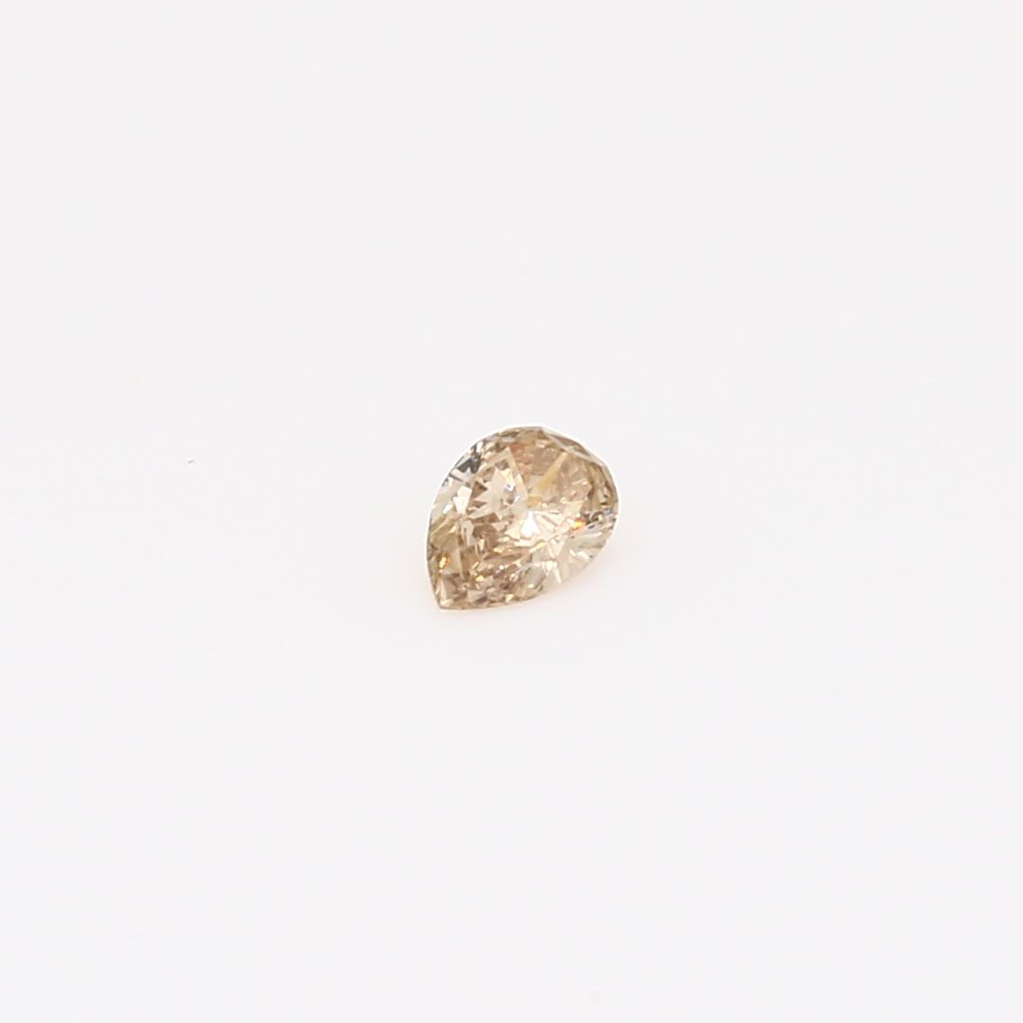 0.12 Carat pear-cut champagne diamond