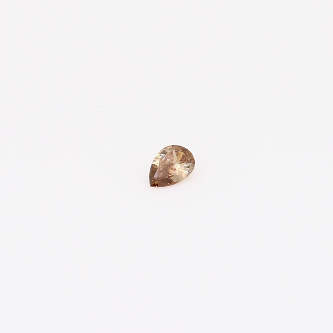 0.04 Carat pear-cut champagne diamond
