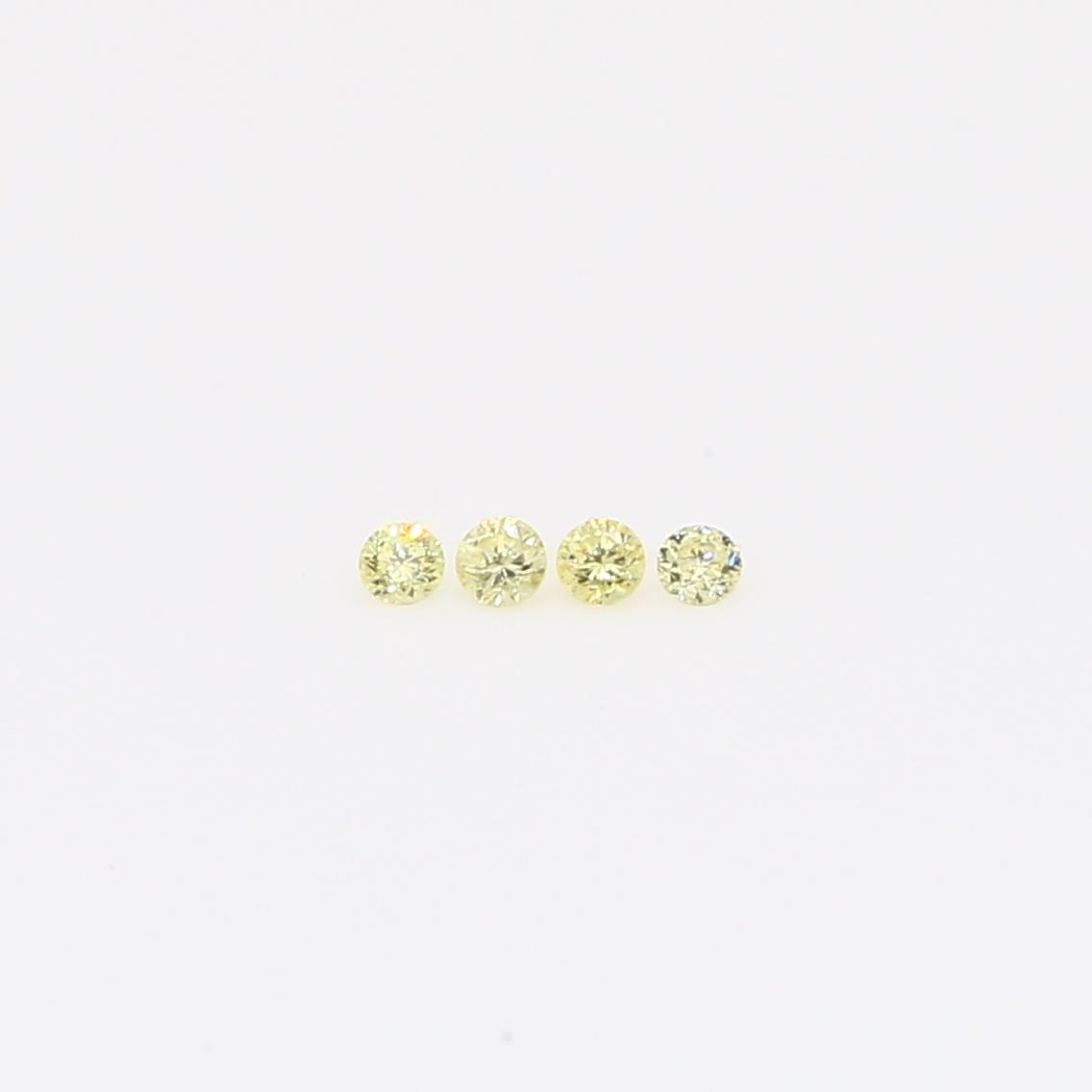 0.04 Total carat parcel of round-cut fancy yellow diamonds