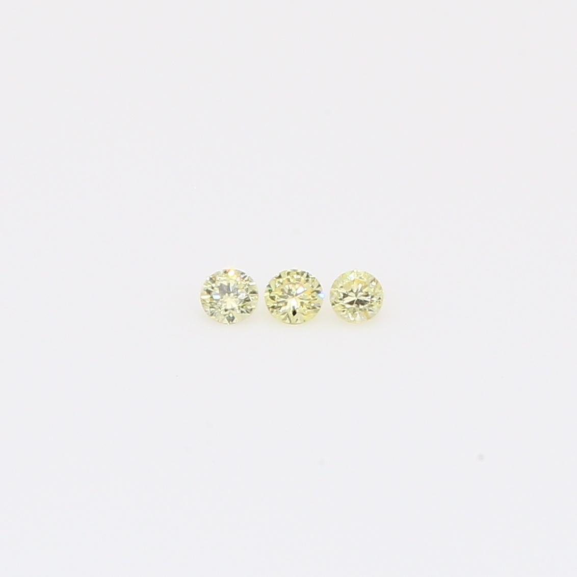 0.06 total carat trio of round-cut fancy yellow diamond
