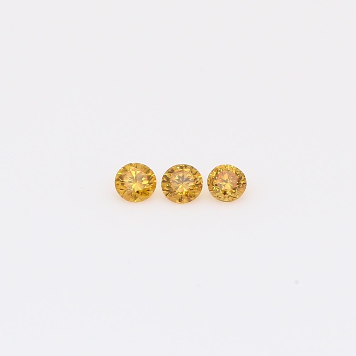 0.09 Total carat trio of round-cut fancy intense orange diamonds