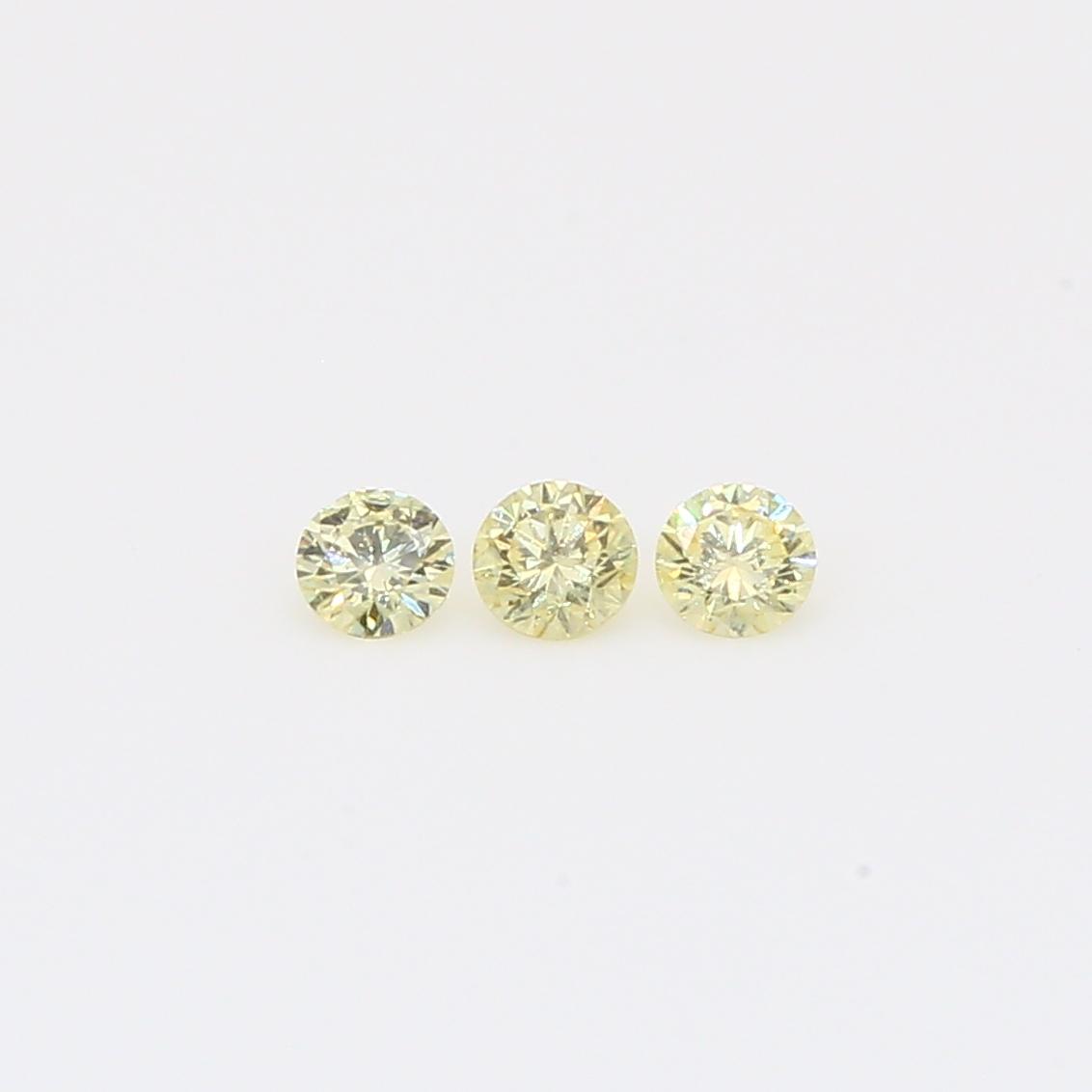 0.18 Total carat trio of round-cut fancy yellow diamonds