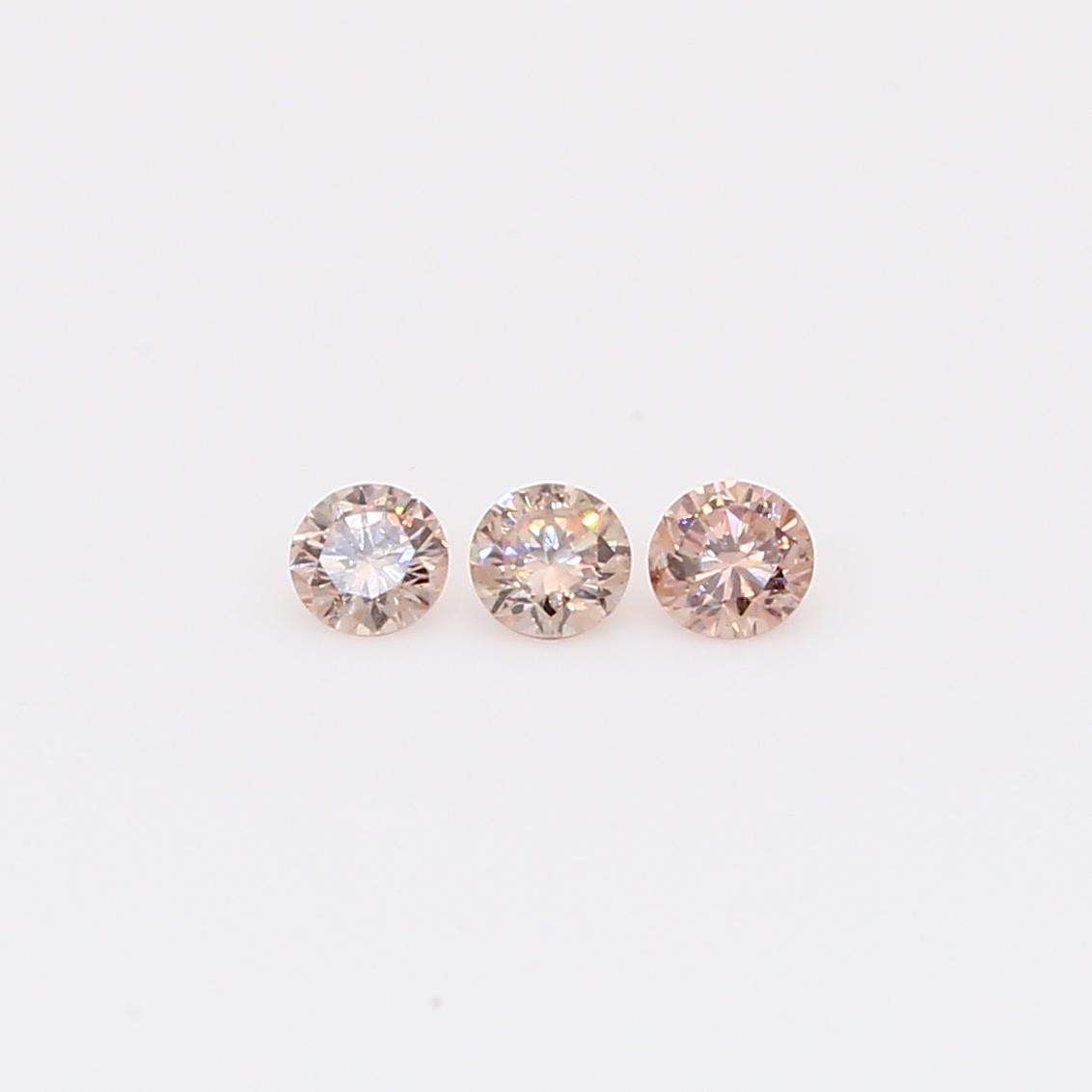 0.18 Total carat trio of round-cut intense pink champagne diamonds