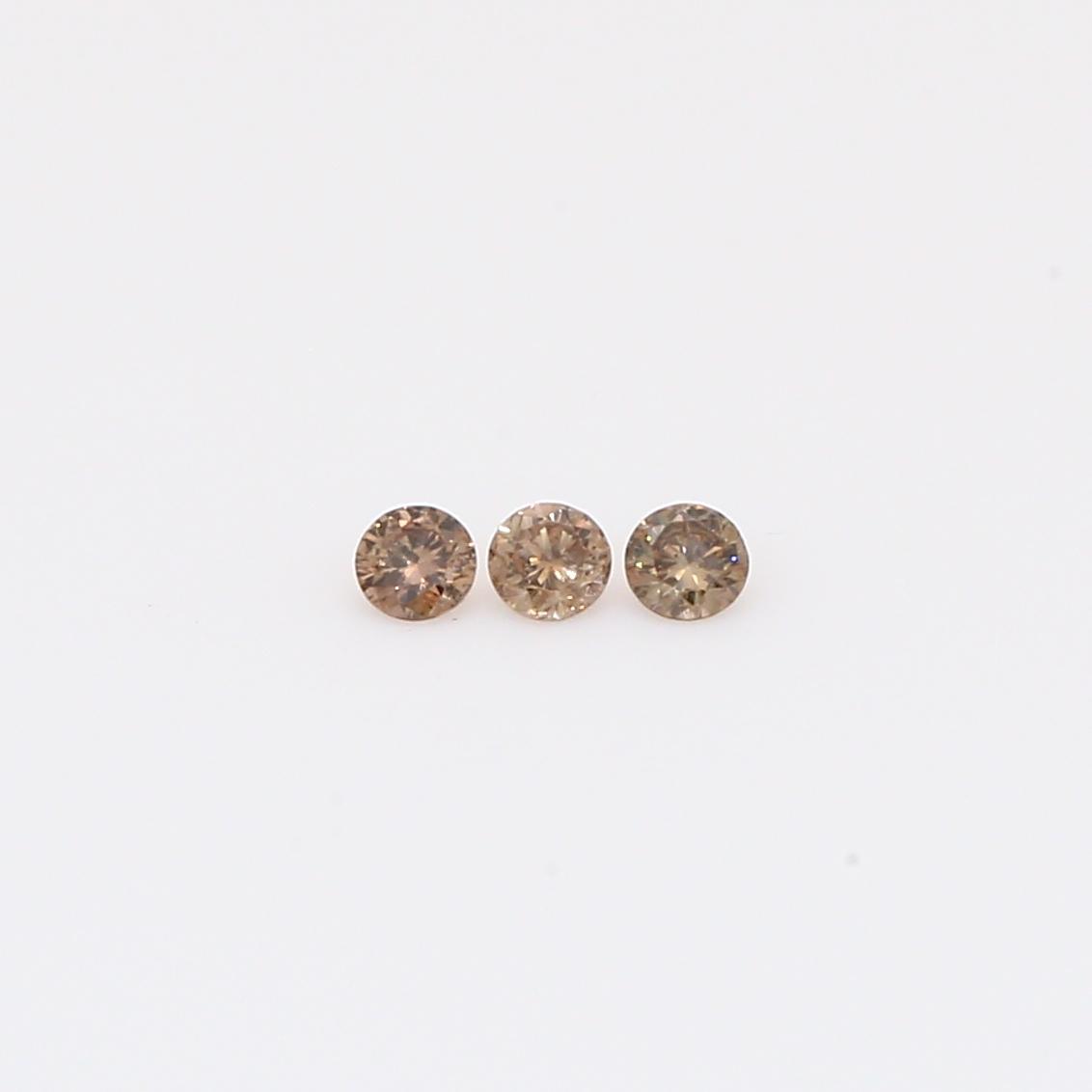 0.06 Total carat trio of round-cut champagne diamonds