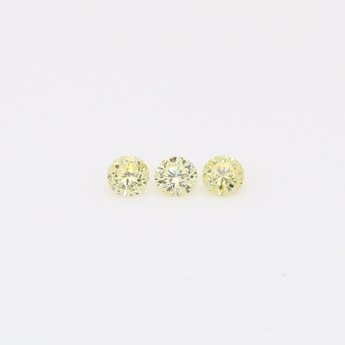 0.105 Total carat trio of round-cut fancy yellow diamonds