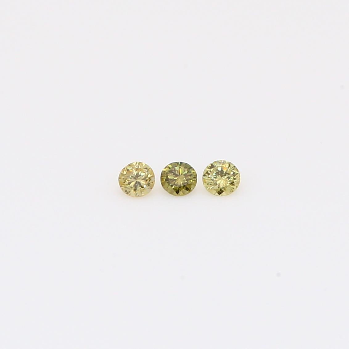0.06 Total carat pair of round-cut fancy green diamonds