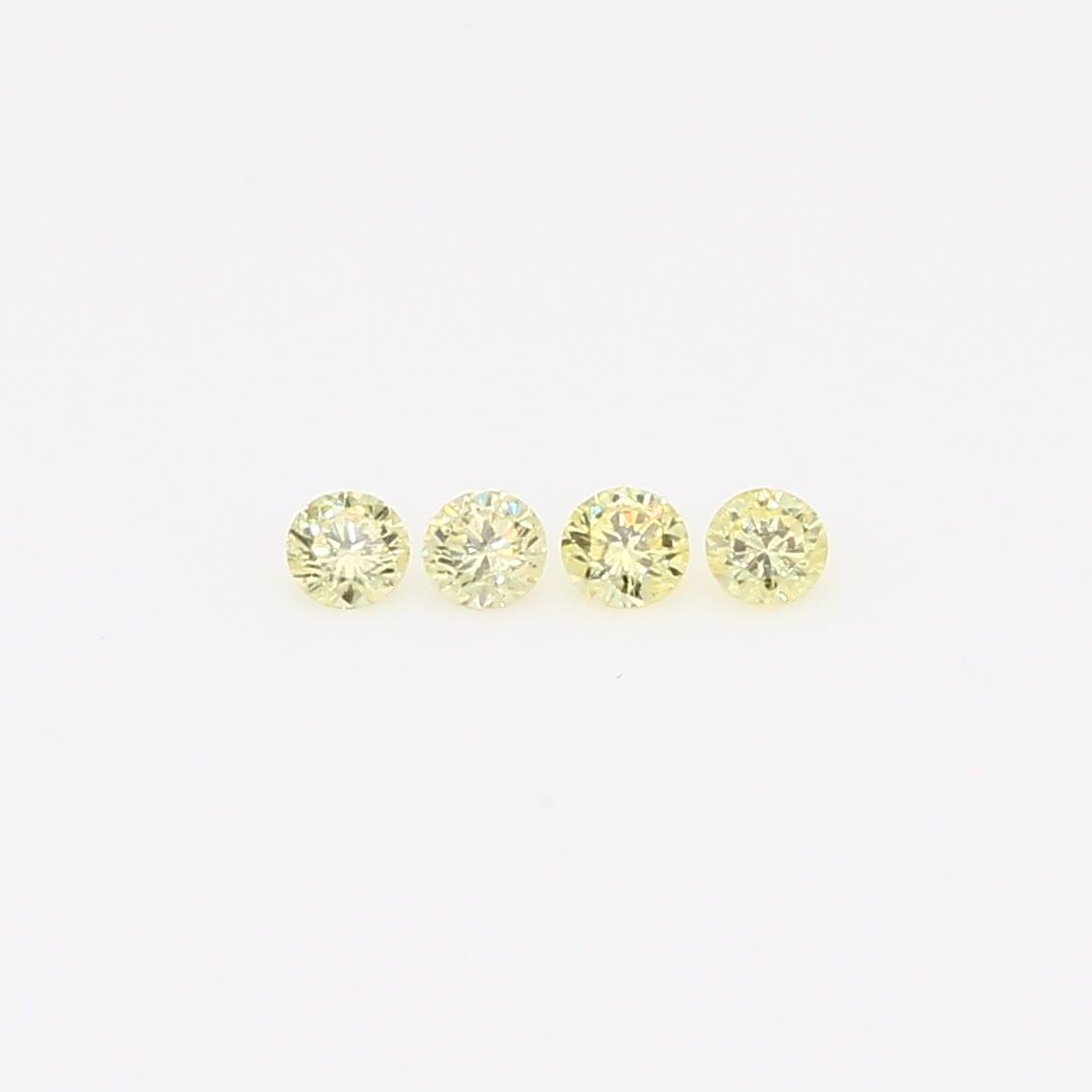 0.12 Total carat parcel of round-cut fancy yellow diamonds