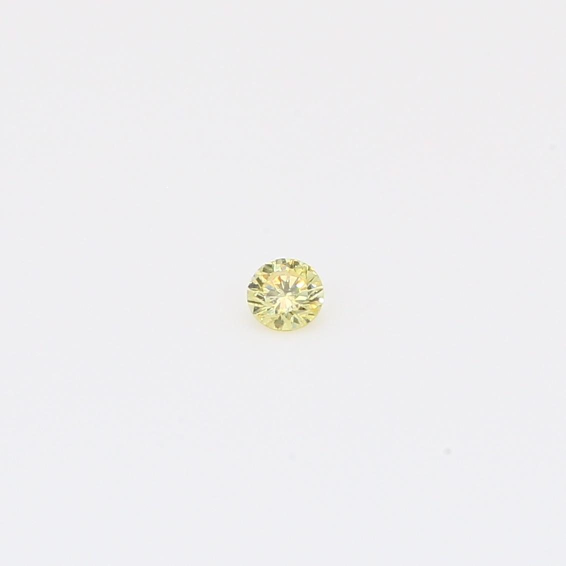 0.045 Carat round-cut fancy yellow diamond