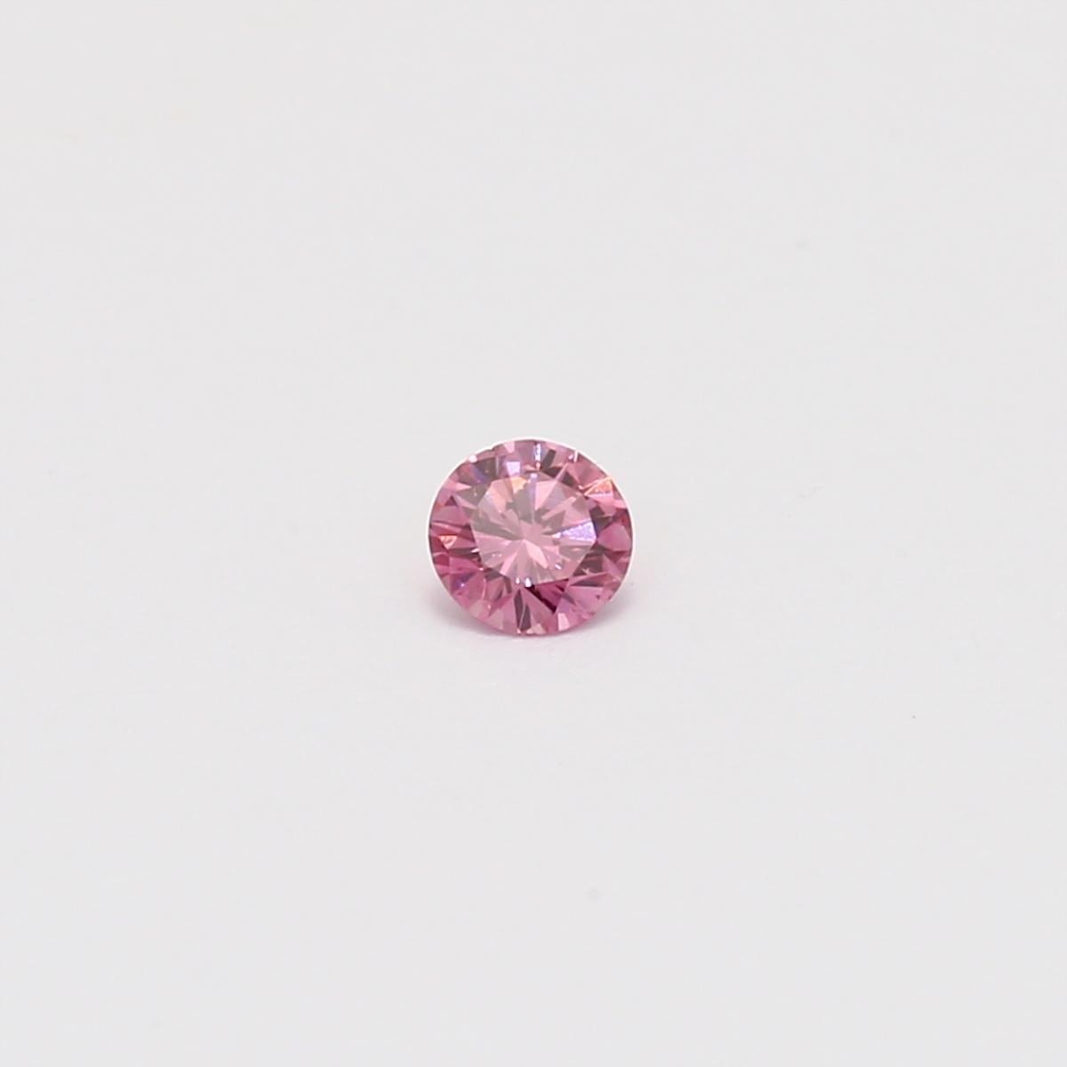 0.12 Carat round cut GIA certified fancy intense purplish pink diamond