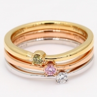 Egret green  white and Argyle pink diamond three ring stack