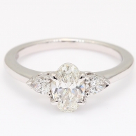 Cortina oval and pear-cut white diamond three-stone engagement ring