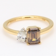 Genesis emerald cut champagne and pear cut white diamond ring