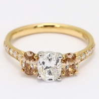 Reign oval cut champagne and white diamond three stone ring