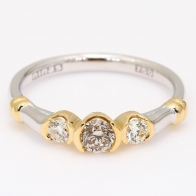 Eyre champagne and white diamond three stone ring