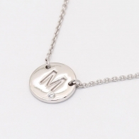 Signature white diamond M initial necklace