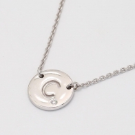 Signature white diamond C initial necklace