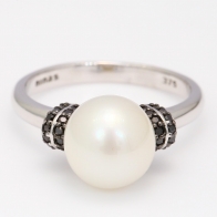 Alabaster white South Sea pearl and black diamond ring