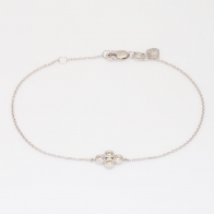 Quarta round-cut white diamond bezel set bracelet