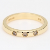 Trilogy champagne diamond three-stone ring