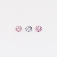 0.075 Total carat trio of round cut pink and blue Argyle diamonds