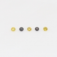 0.03 Total carat parcel of round cut yellow and black diamonds