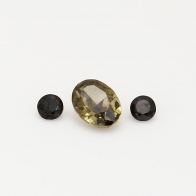 0.37 Total carat trio of oval cut green and round cut black diamonds