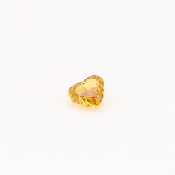 0.19 Carat heart cut orange yellow diamond