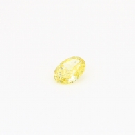 0.18 Carat oval cut yellow diamond
