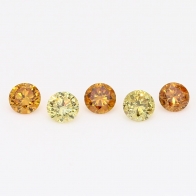 0.40 Total carat parcel of round-cut orange and yellow diamonds