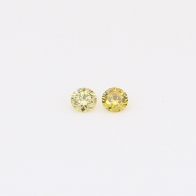 0.08 Total carat pair of round-cut fancy yellow diamonds