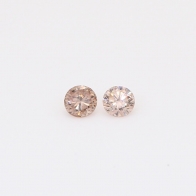 0.16 Total carat pair of round-cut intense pink champagne diamonds
