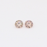 0.22 Total carat pair of round-cut intense pink champagne diamonds