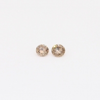 0.08 Total carat pair of round-cut champagne diamond